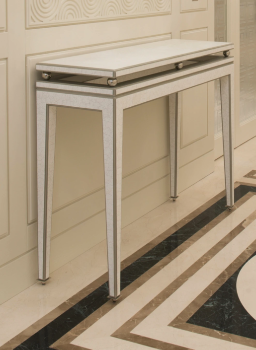 Fabio Mazzeo <br> Paris console – Eggshell finishing <br> 2011 <br> Multi-layer fir wood base plated with MDF; Hand-inserted eggshell coating; AISI 304 steel balls. Finished with 30 gloss transparent epoxy lacquer <br> 118 x 38 x 92cm